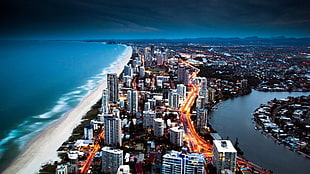 aerial shot photography of city near shore