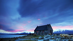 gray brick chapel near body of water under blue sky, landscape, house, cottage HD wallpaper
