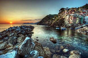City on mountain beside sea during sunset, cinque terre HD wallpaper