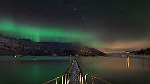 footbridge leading to body of water fronting mountain and sky phenomenon, nature, landscape, Norway, mountains