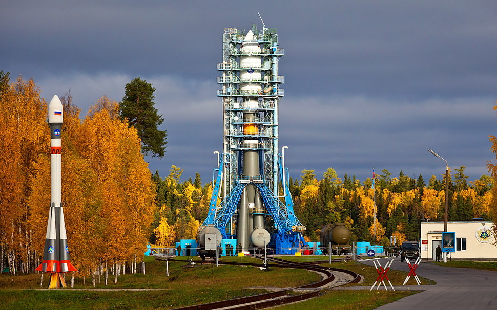 blue and white rocket, rocket, clouds, Russian, trees HD wallpaper