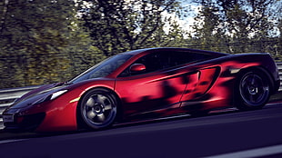 timelapse photography of red Lamborghini luxury car on road