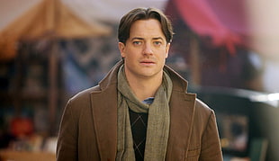 Man wearing brown suede coat