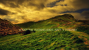 green mountain hill with text overlay, fuckscape