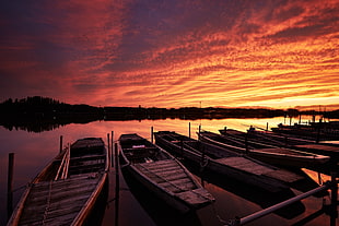 boats on body of water near dock during golden hour HD wallpaper