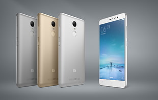 four Xiaomi Mi android smartphones