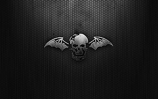 gray skull with wings graphics