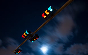 four assorted-color traffic lights, night, city, lights, traffic lights
