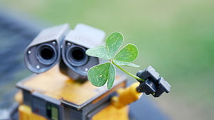 green clover leaf and yellow Wall-E robot toy, WALL·E, Shamrock