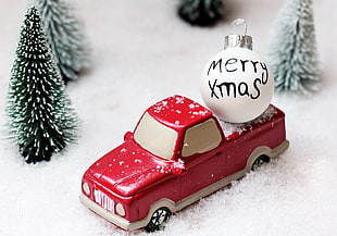 white bauble on red single cab pickup truck scale model HD wallpaper