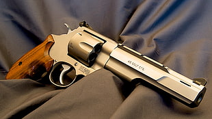 silver and brown Colt pistol, gun, pistol, Smith & Wesson, revolver