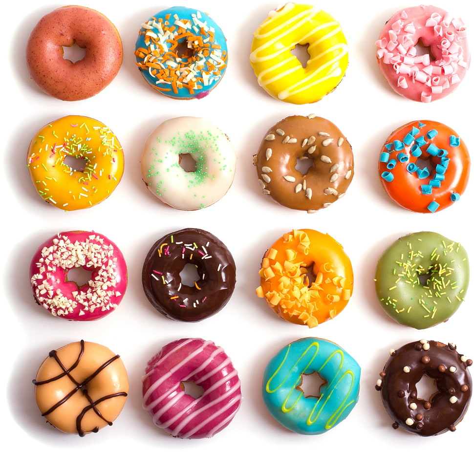 assorted-flavor doughnut lot on top surface HD wallpaper