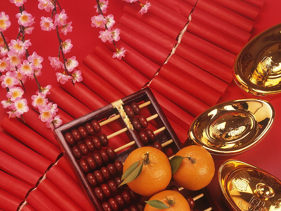 three orange fruits on top of abacus HD wallpaper