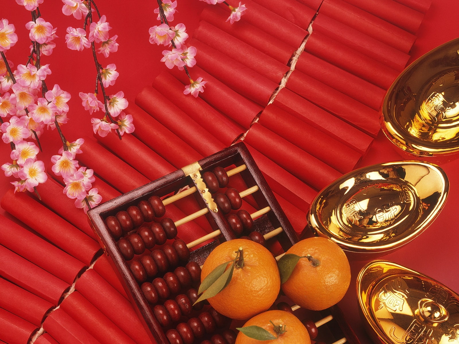 three orange fruits on top of abacus