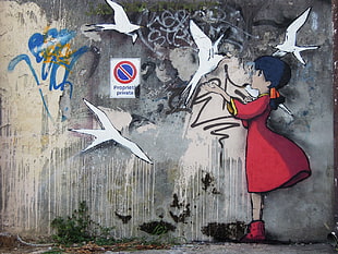 girl in red dress and white birds painting on wall