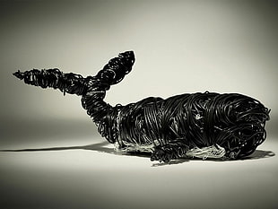 macro shot of black whale figure