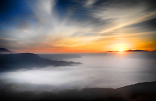 bed of clouds under calm sky during golden hour HD wallpaper