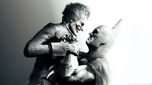 Batman and The Joker grayscale photo