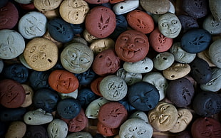multicolored emoji stones