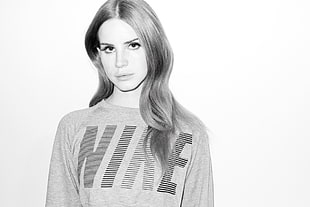 woman wearing Nike crew-neck top grayscale photography