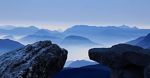 blue and black mountain photo during day time