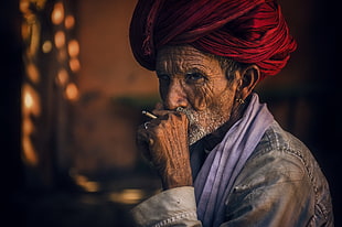 men's red turban headdress, old people, men, smoking, cigarettes