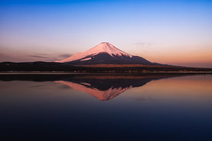 landscape photo of mountain and body of water