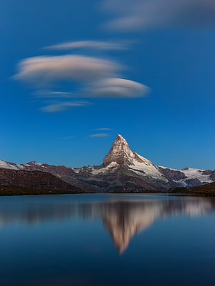 landscape reflection photography of mountain