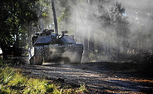gray battle tank in the middle of forest HD wallpaper