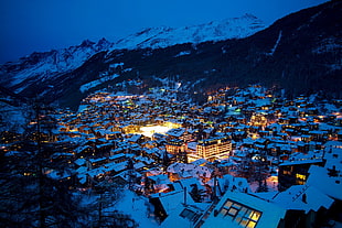 aerial photography of village covered of snow, mountains, city, winter, city lights