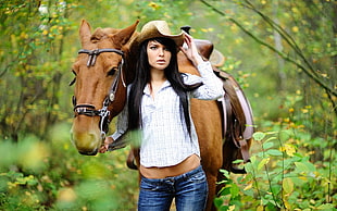 woman at the back of brown horse HD wallpaper