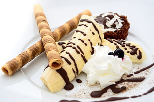 waffer stick with banana with chocolate toppings