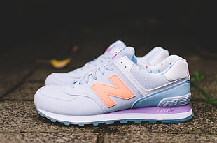 white-and-blue New Balance low-top sneakers