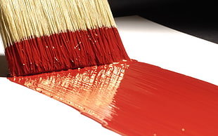 red paints on white panel