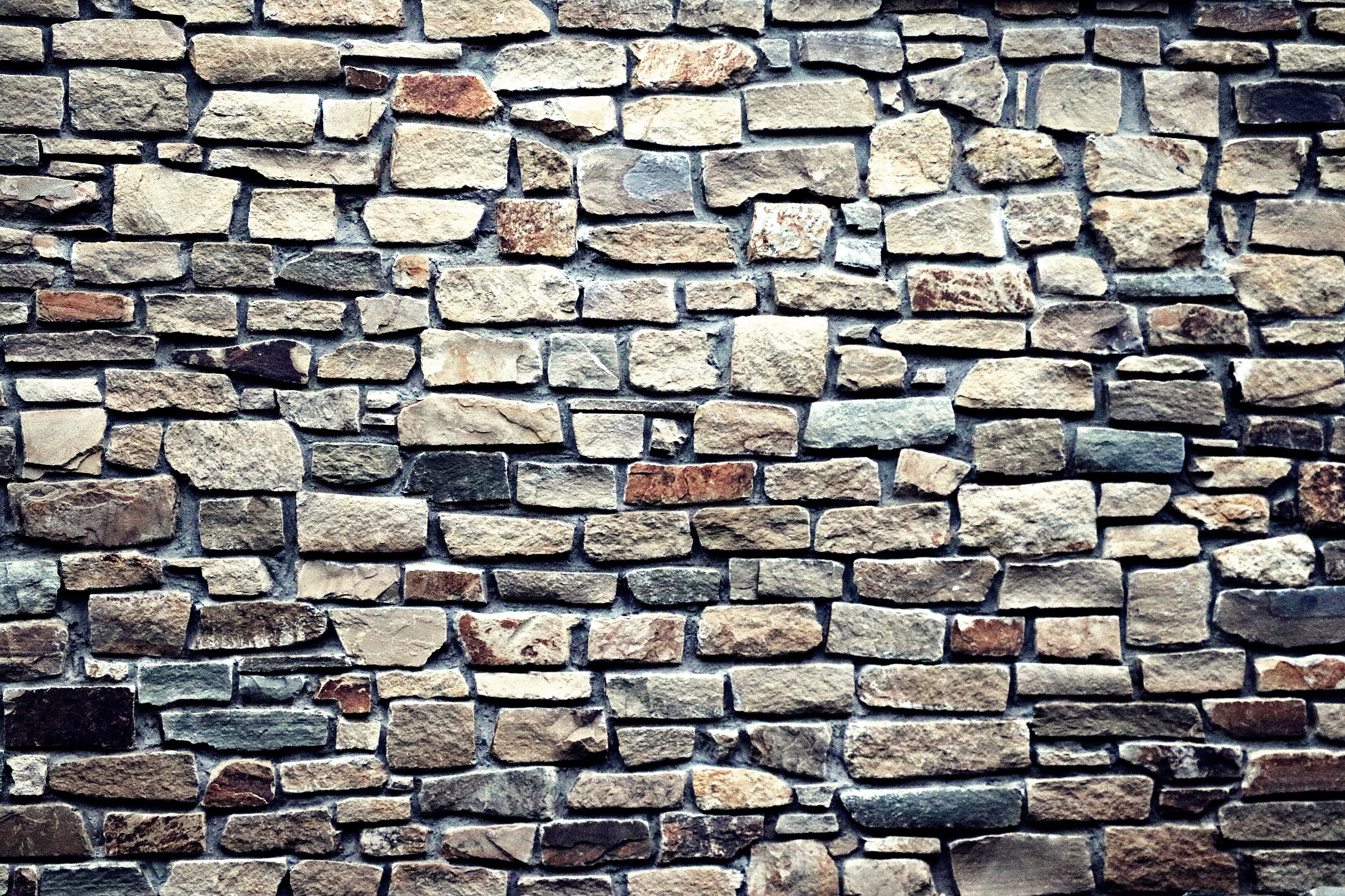 gray and brown brick wall