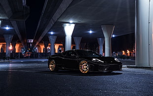 black Porsche coupe