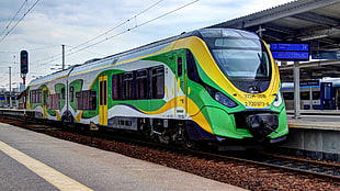 green, white, and yellow train, Poland, train, railway station, vehicle
