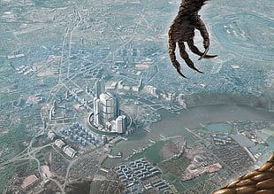 game application screenshot, aerial view, cityscape, creature, claws