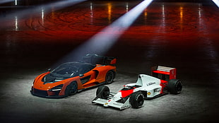 two red, orange, and white racing vehicles HD wallpaper