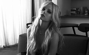 grayscale photography of blonde woman