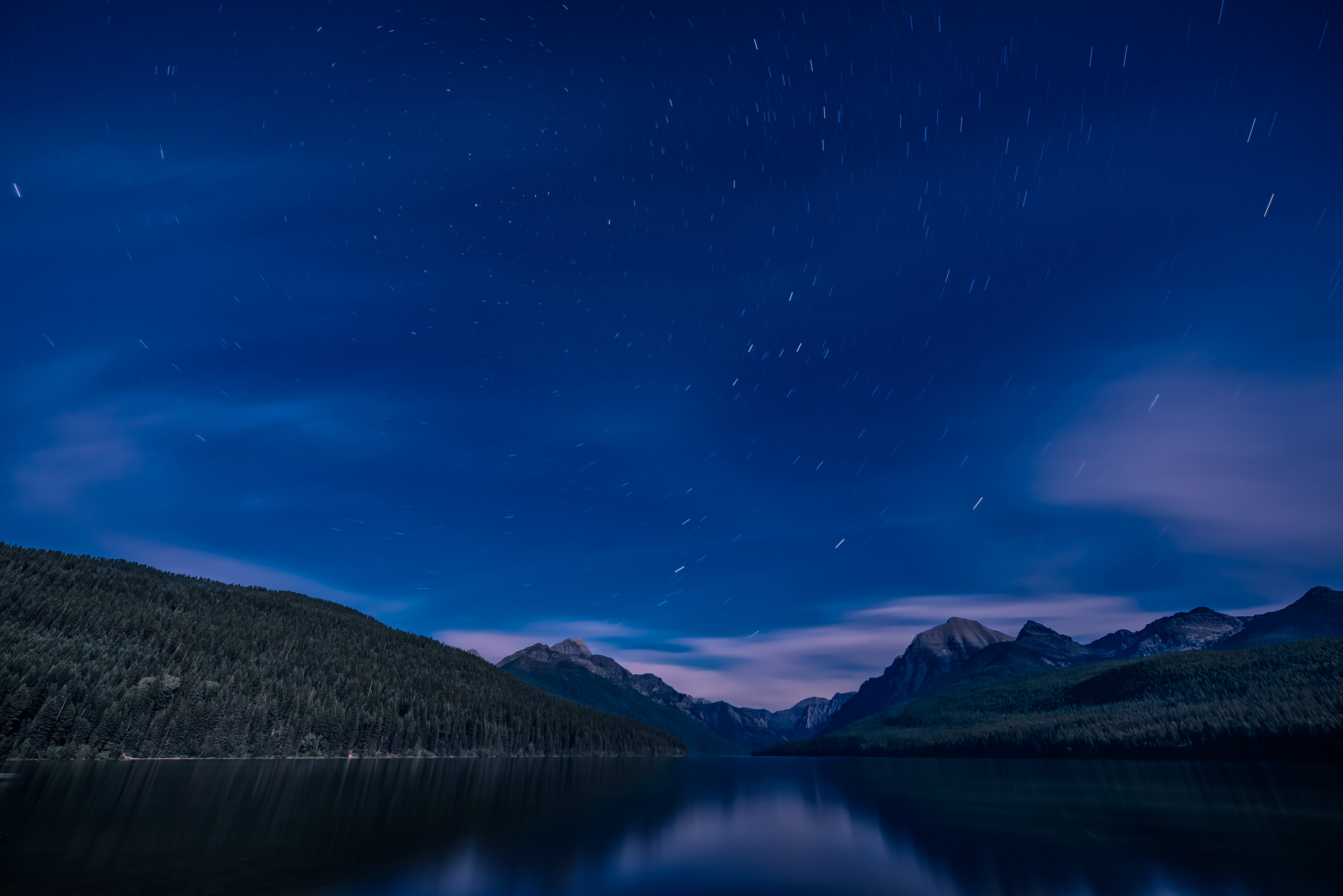 Calm Water Between Two Mountains Under The Blue Starry Night Bowman