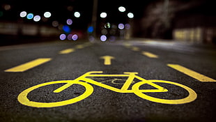 selective focus photography of bike lane signage HD wallpaper