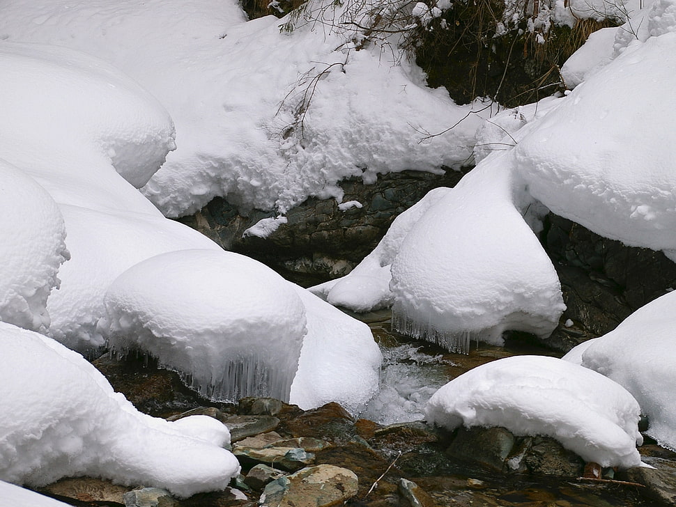 rocks covered in snow at daytime HD wallpaper