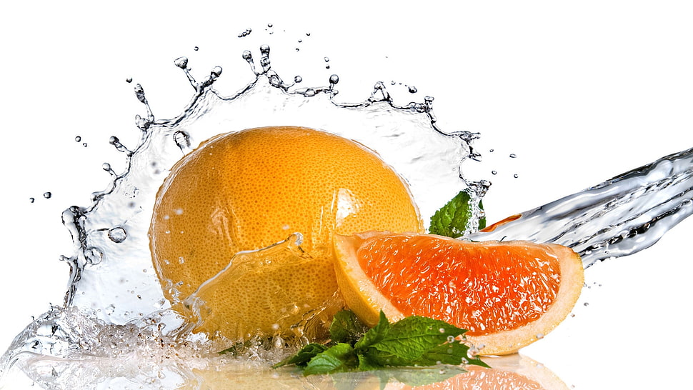 sliced orange fruit HD wallpaper