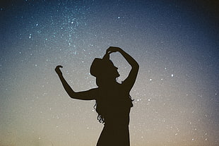 woman silhouette photo with stars