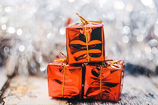 three red gift boxes