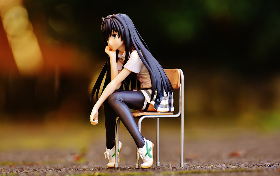 female anime character pvc sitting on chair HD wallpaper