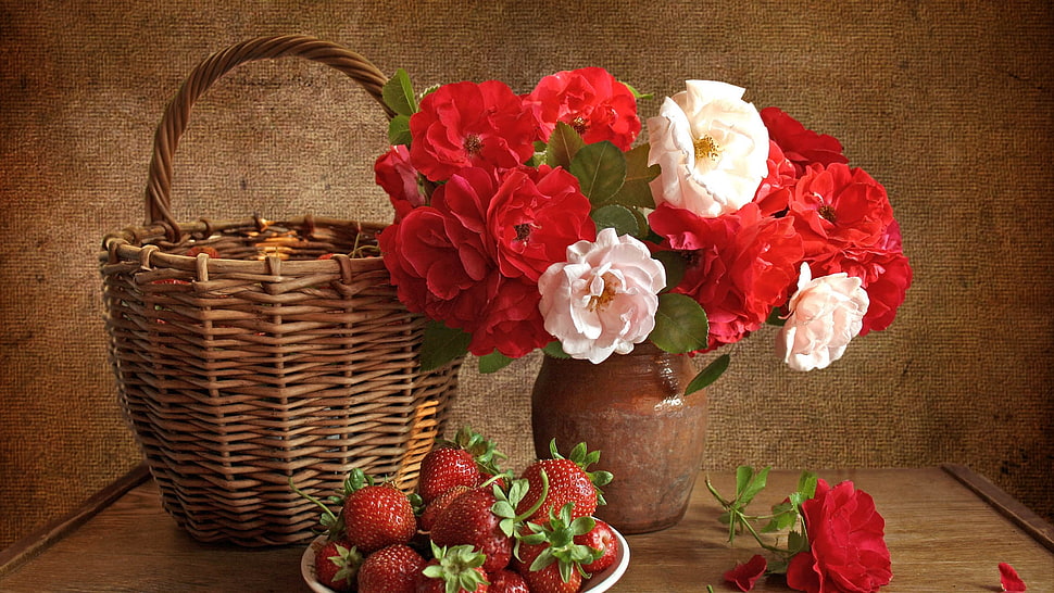 closeup photo of white and red flowers on vase near wicker basket HD wallpaper