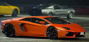 orange Lamborghini Aventador scale model HD wallpaper
