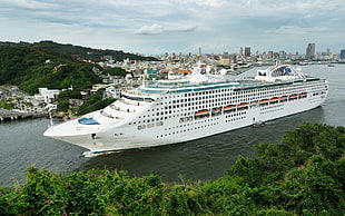 white cruise ship sailing
